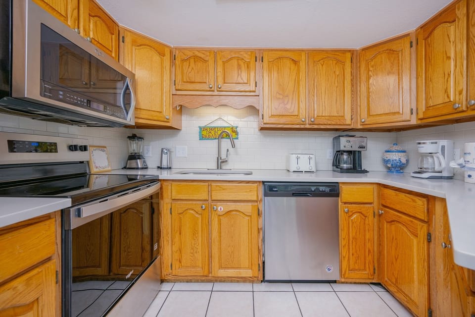 Condo, 2 Bedrooms | Private kitchen | Coffee/tea maker, fridge, oven