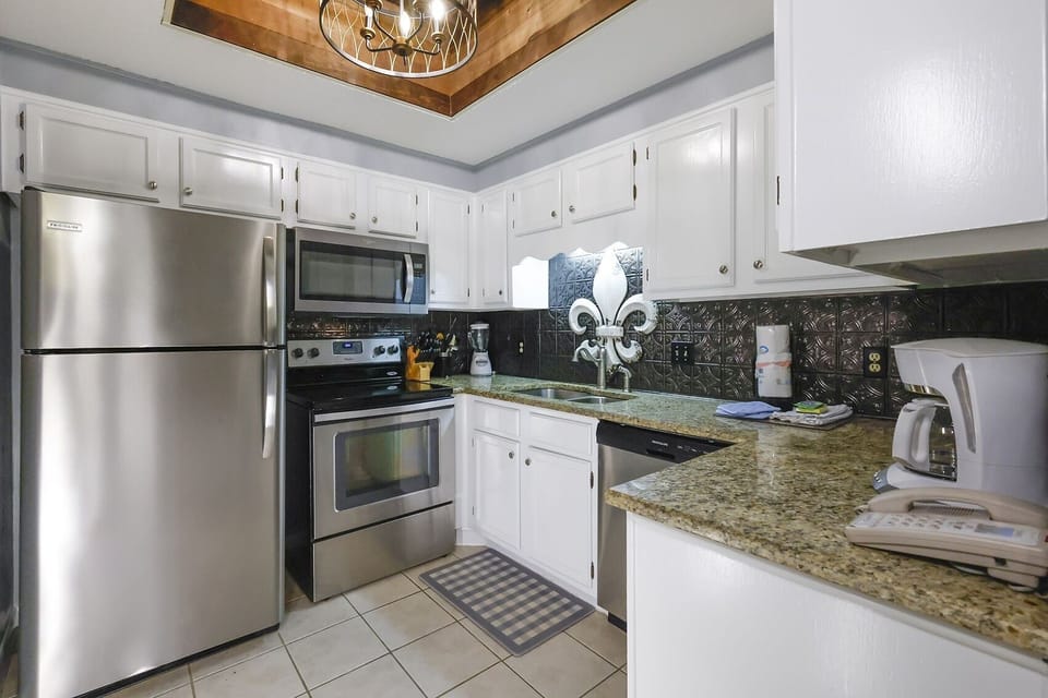 Condo, 2 Bedrooms | Private kitchen | Coffee/tea maker, fridge, oven