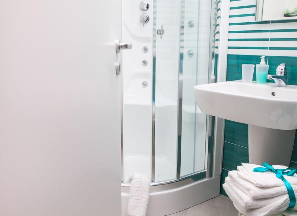 Shower, free toiletries, hair dryer, bathrobes
