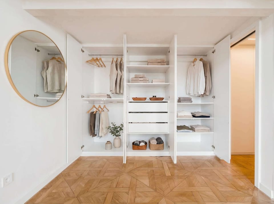 Spacious wardrobe with open shelving and plenty of storage for a comfortable longer stay.