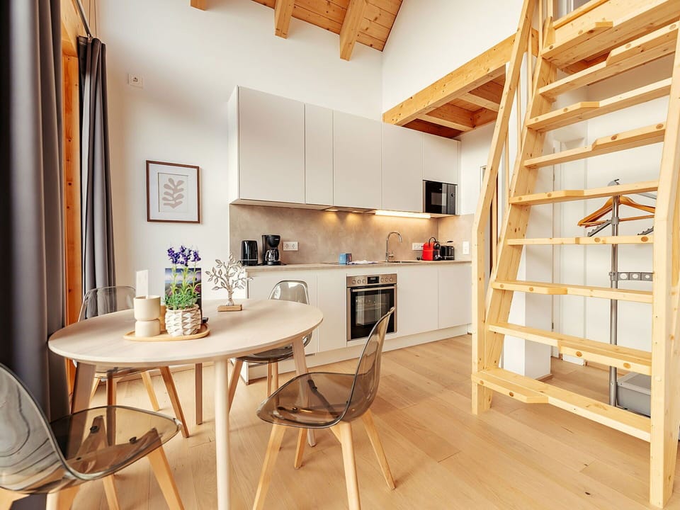 Furniture, Interior Design, Flooring, Floor, Wood, Wood Flooring, Room, Ceiling, Chair, Home
