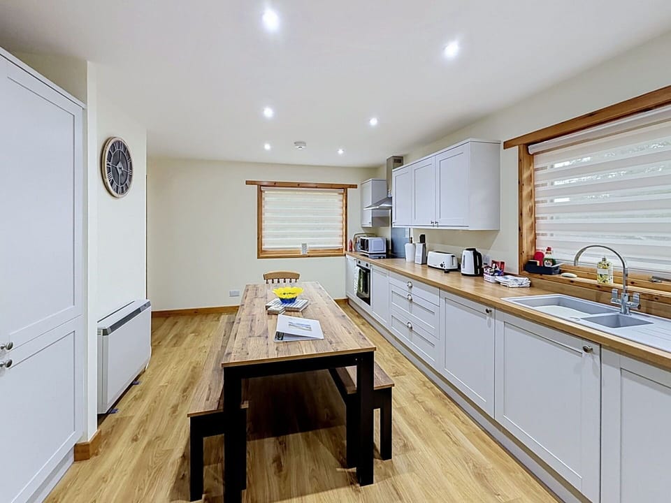 Interior Design, Furniture, Flooring, Wood, Ceiling, Floor, Kitchen, Countertop, Room, Lighting