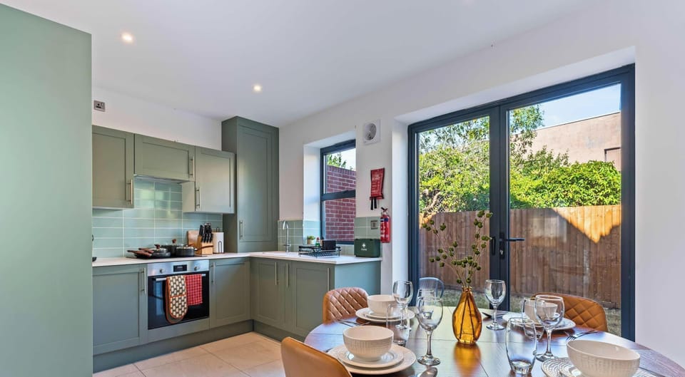 Open-plan kitchen and dining with garden access