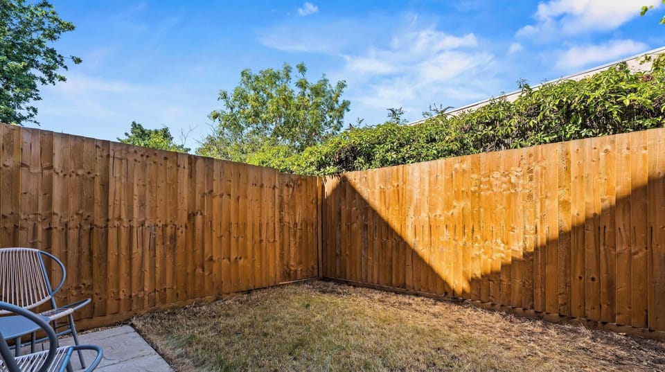 Private enclosed garden with outdoor seating