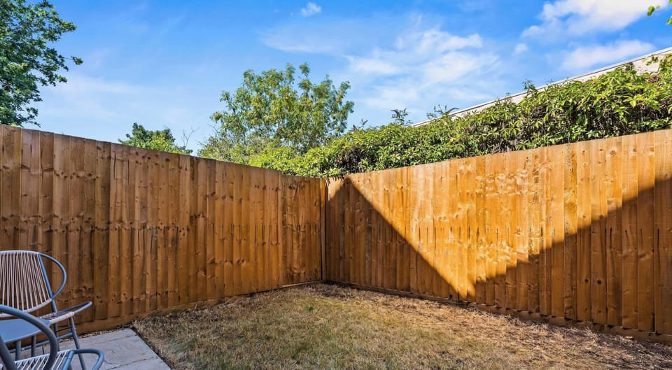 Private enclosed garden with outdoor seating