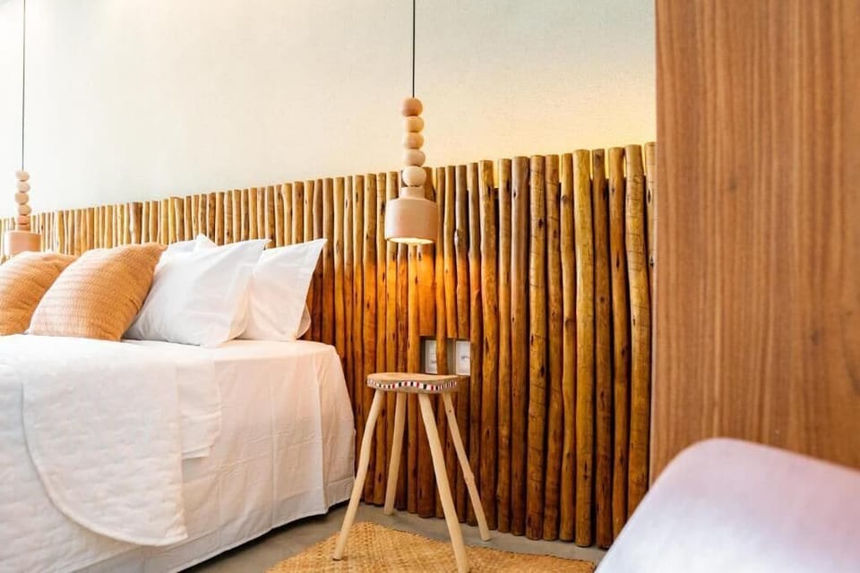 Standard Triple Room, Garden View | Minibar, WiFi (free), bed sheets