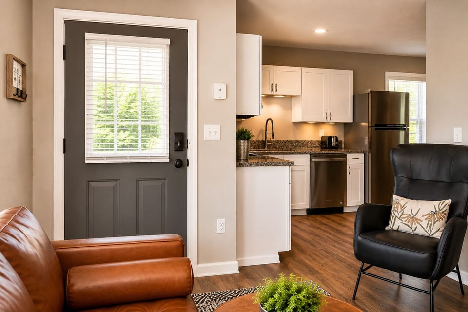 Bright open living area with modern kitchen and stylish seating