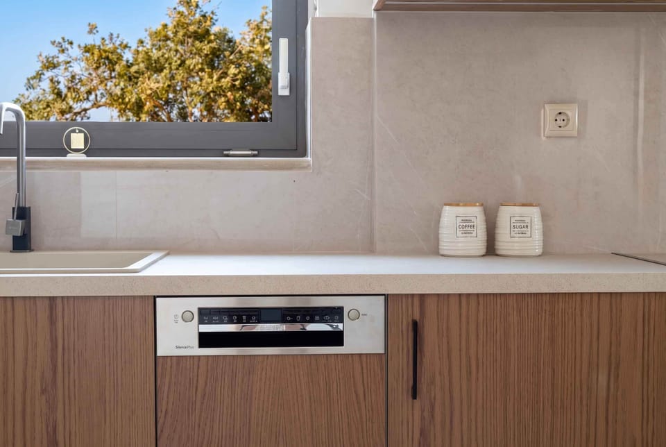 Deluxe Villa, Sea View | Private kitchen | Coffee/tea maker, full-size fridge, microwave, oven