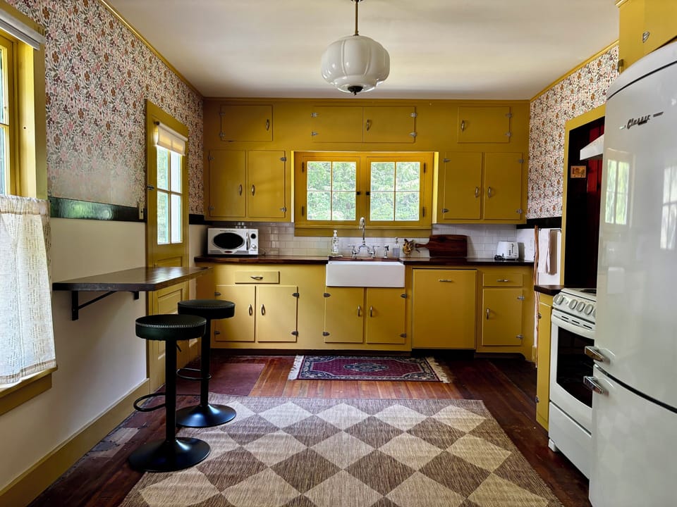 Full kitchen with coffee pot, toaster, microwave, instant pot and more!