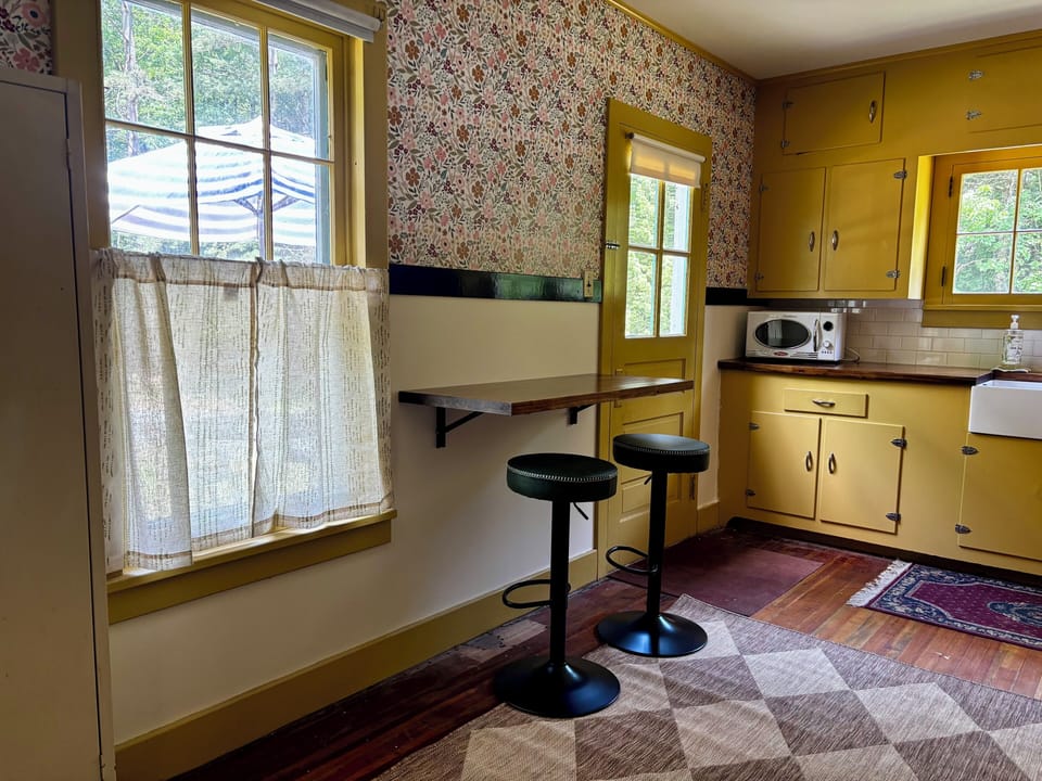 Full kitchen with coffee pot, toaster, microwave, instant pot and more!