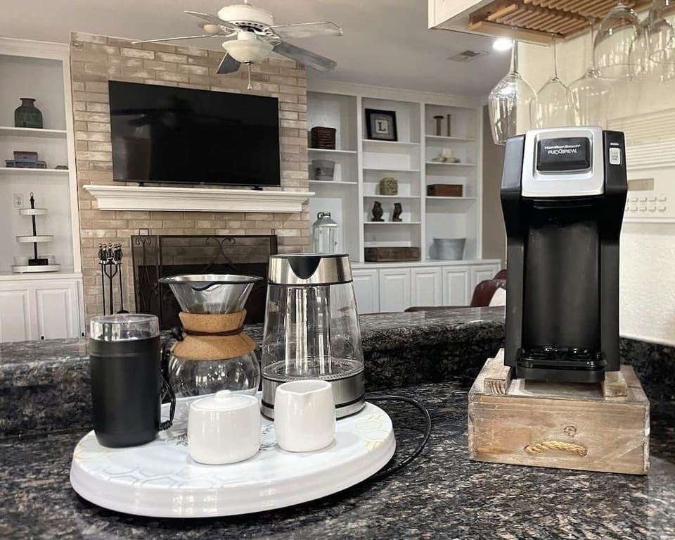 COFFEE AND MORNING SETUP

- Coffee maker (drip / Keurig)
- Coffee mugs
- Electric kettle 
- Coffee and Tea Supplied