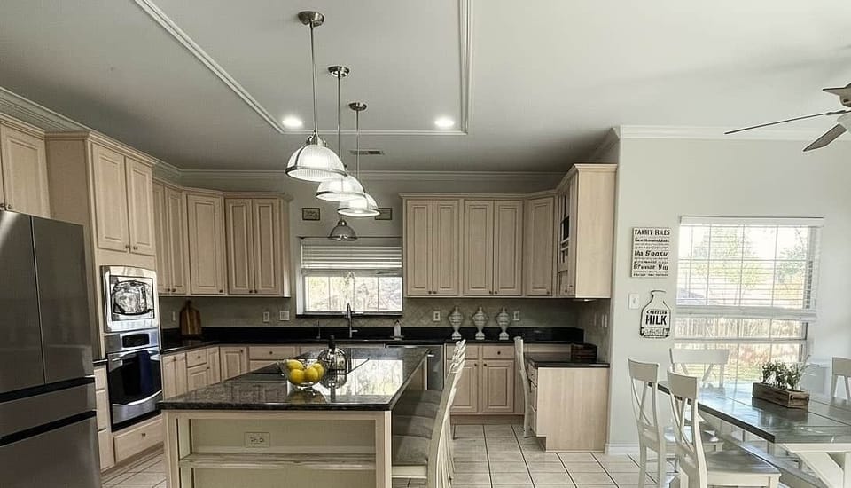 KITCHEN AND DINING 

Fully equipped kitchen with spacious island seating, perfect for cooking and gathering

• Full cookware & bakeware
• Dinnerware for large groups
• Large prep space
• Everything you need for group meals