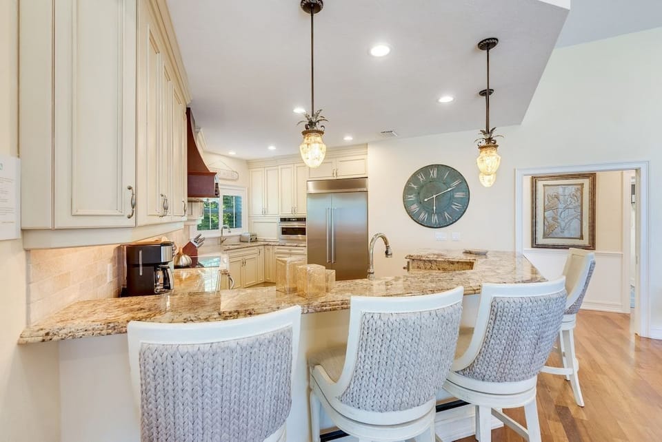 The dining area opens onto the kitchen for easy meal prep.