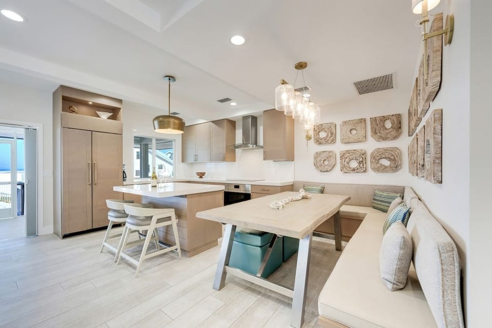 The dining area opens onto the kitchen for easy meals.