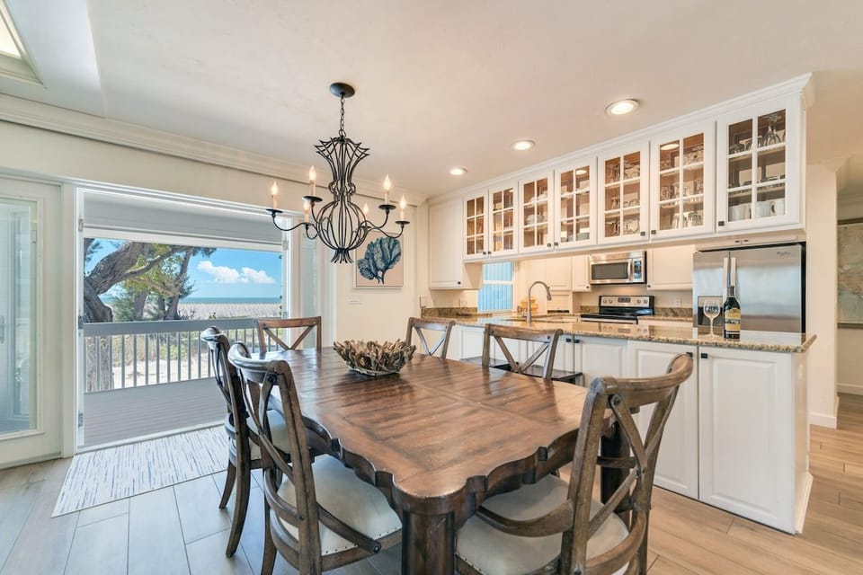 The dining area opens onto the kitchen for easy meals.
