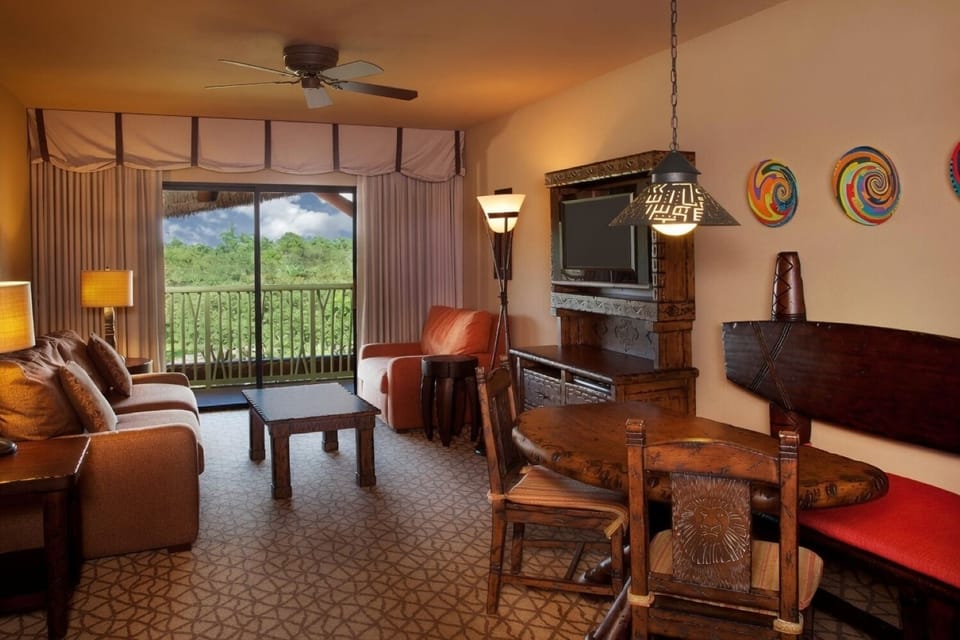 Living Room + Dining Area with Savanna Balcony View