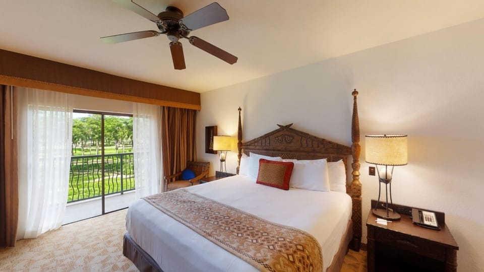Primary Bedroom • King Bed + Balcony