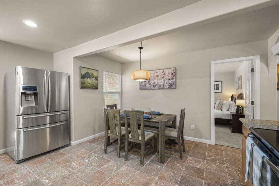 Main Level: Fully equipped kitchen with stainless steel appliances, coffee maker, toaster, cookware, and everything you need to prepare meals.