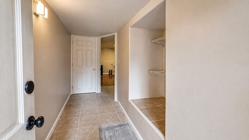 Settle in comfortably with a convenient entryway and built-in space for your shoes, bags, and travel essentials.