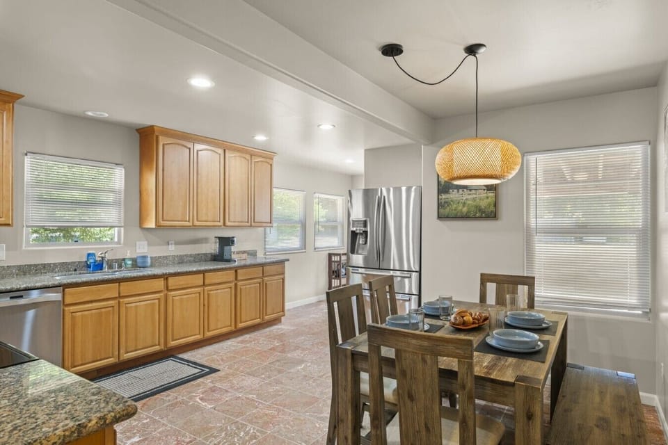 Main Level: Fully equipped kitchen with stainless steel appliances, coffee maker, toaster, cookware, and everything you need to prepare meals.