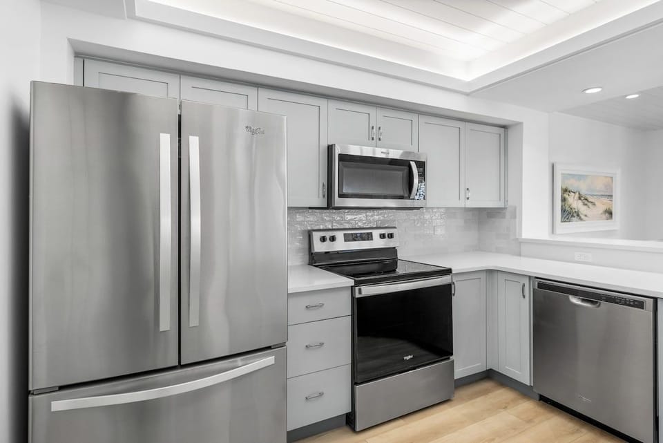 The kitchen comes equipped for cooking full meals.