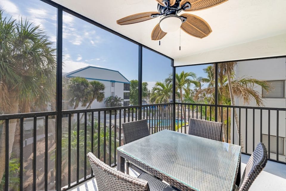 The screened balcony offers a spot for fresh air.