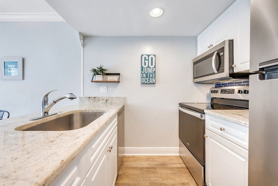 The kitchen comes equipped for cooking full meals.