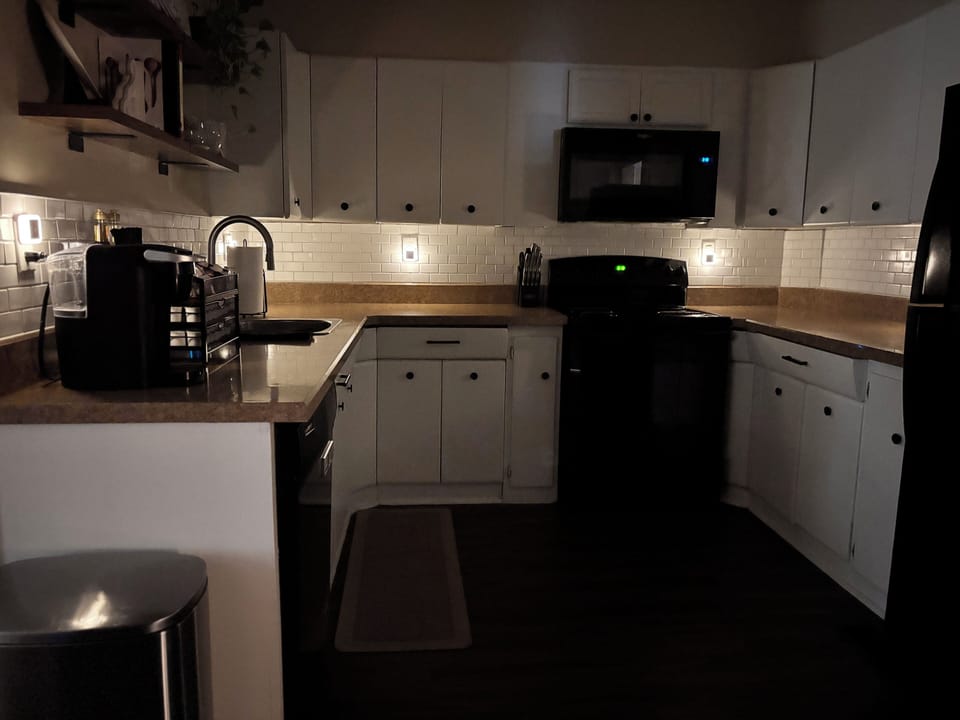 Cozy modern kitchen with coffee station and plenty of prep space
