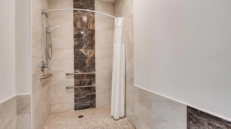 Combined shower/tub, hair dryer, towels, soap