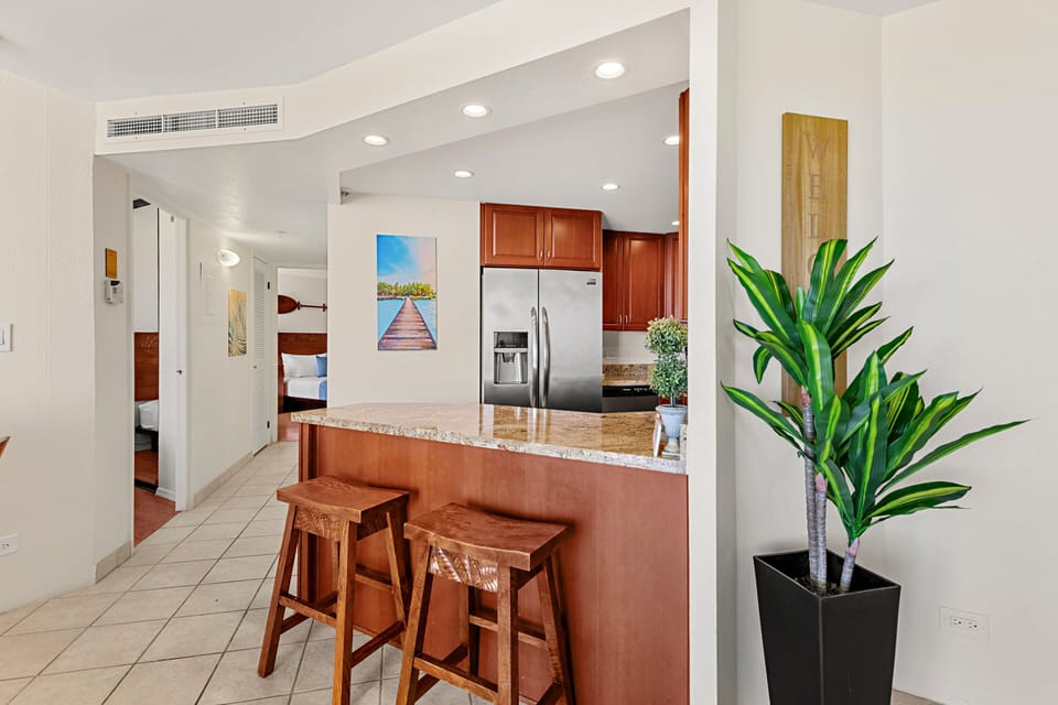 Breakfast bar with additional seating for casual dining.