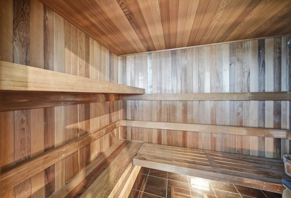 Cedar-lined sauna for ultimate relaxation.