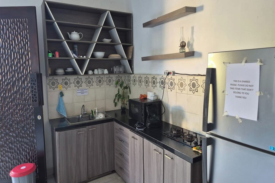 Coffee/tea maker, shared fridge, shared microwave, electric kettle