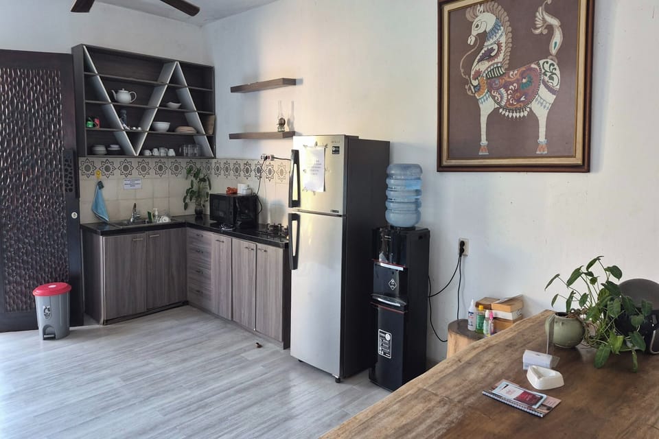Coffee/tea maker, shared fridge, shared microwave, electric kettle