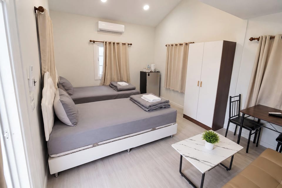 Premium Twin Room, Terrace | Minibar, desk, WiFi (free), bed sheets