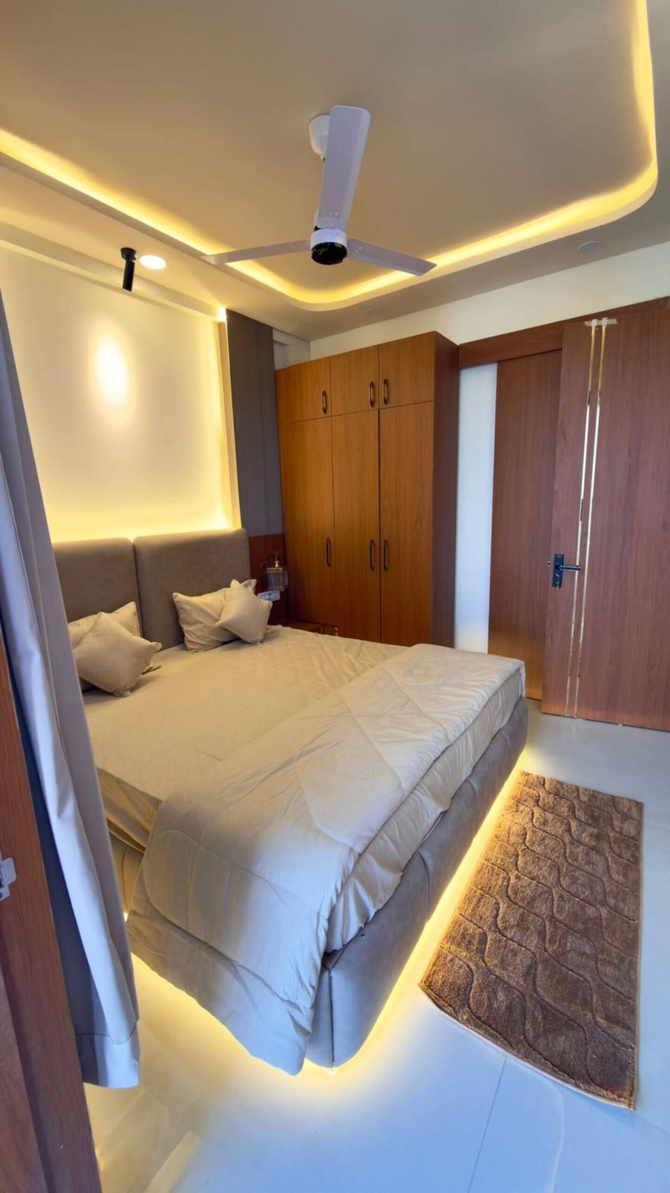 Bedroom 2 designed to deliver comfort with spring mattresses n bed side lamps