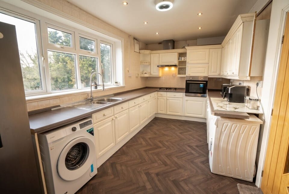 Light filled kitchen with garden views while you cook together