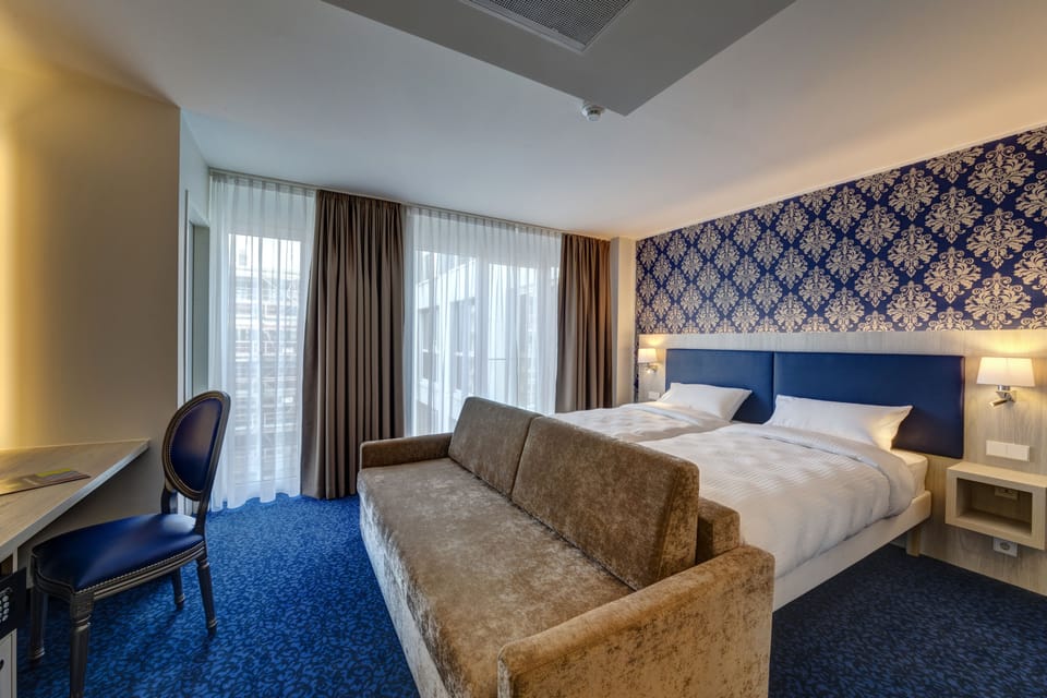 Family Room, 1 Double Bed with Sofa bed (All Comfort) | In-room safe, desk, soundproofing, iron/ironing board