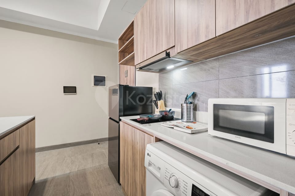 Apartment, 2 Bedrooms, City View | Private kitchen | Full-size fridge, microwave, stovetop, cookware/dishes/utensils