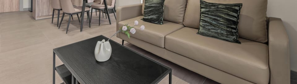Apartment, 2 Bedrooms, City View | Living area | 43-inch Smart TV with cable channels, Netflix, streaming services
