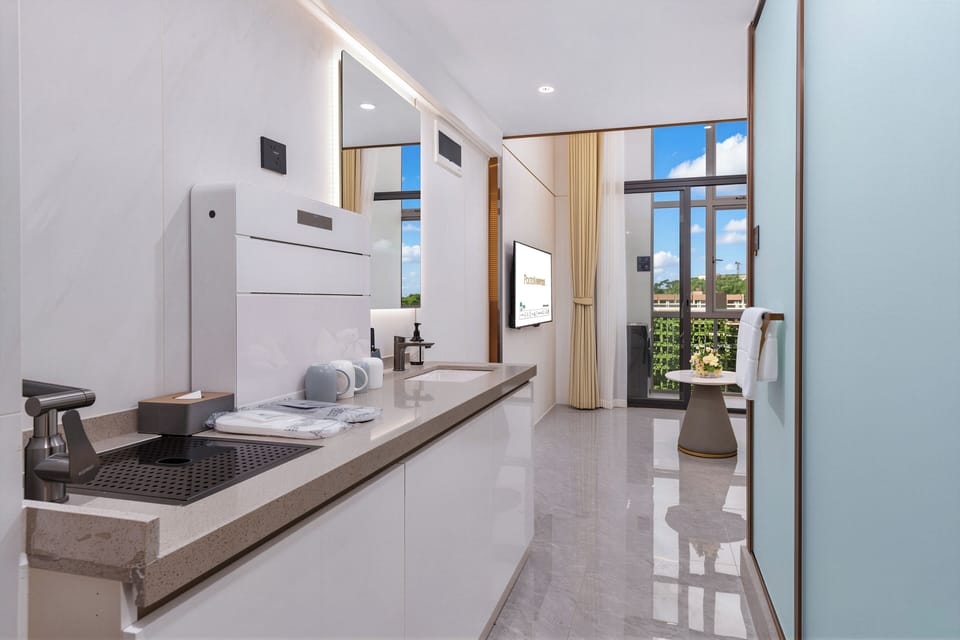 Deluxe Duplex King Suite | Living area | 75-inch TV with cable channels, pay movies, smart speakers