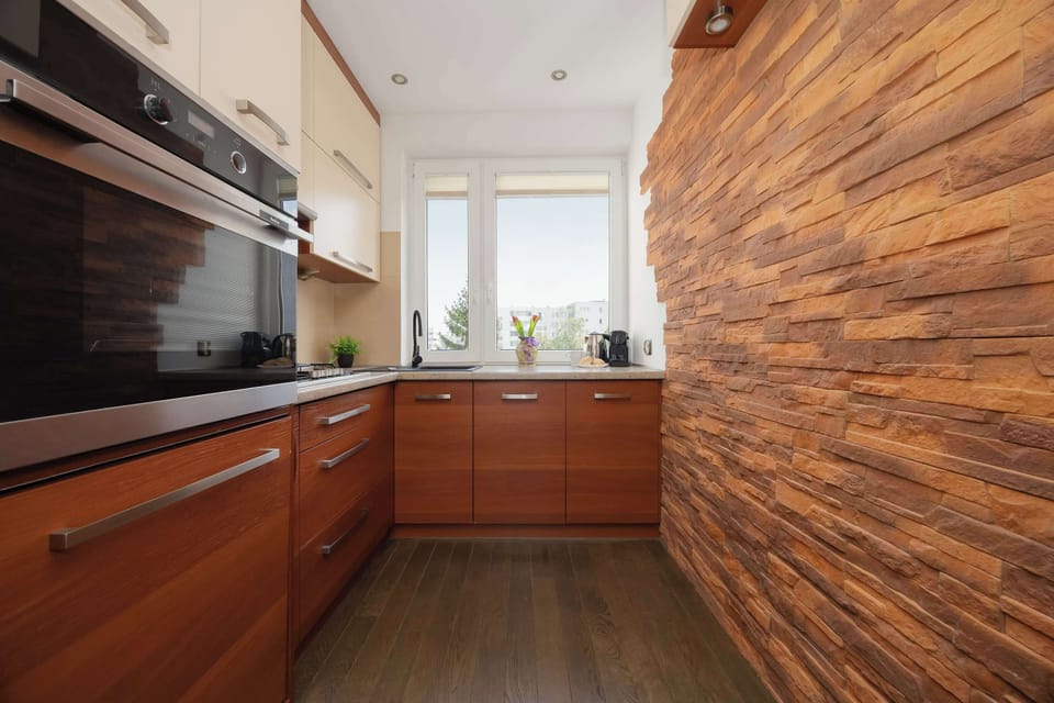 Alternative view of the fully equipped kitchen with ample preparation space.