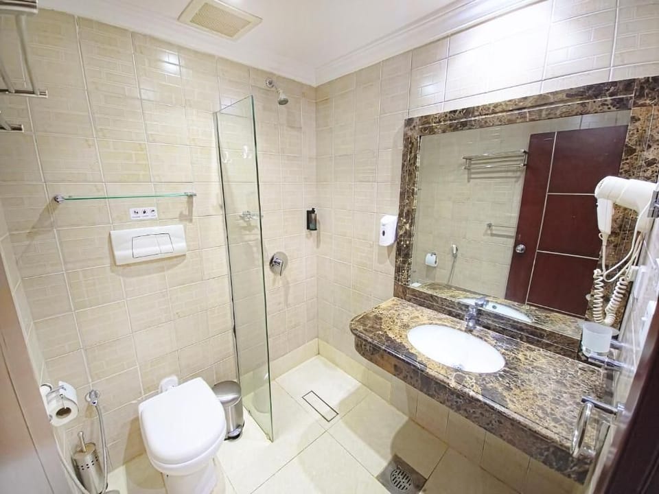 Shower, free toiletries, hair dryer, soap