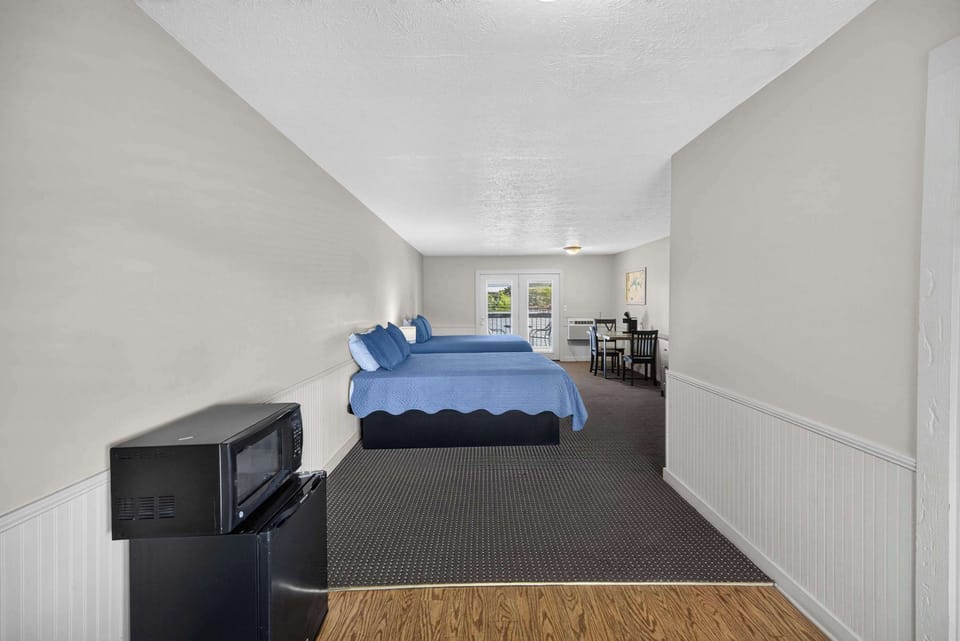 Entrance to your unit with a mini fridge and microwave