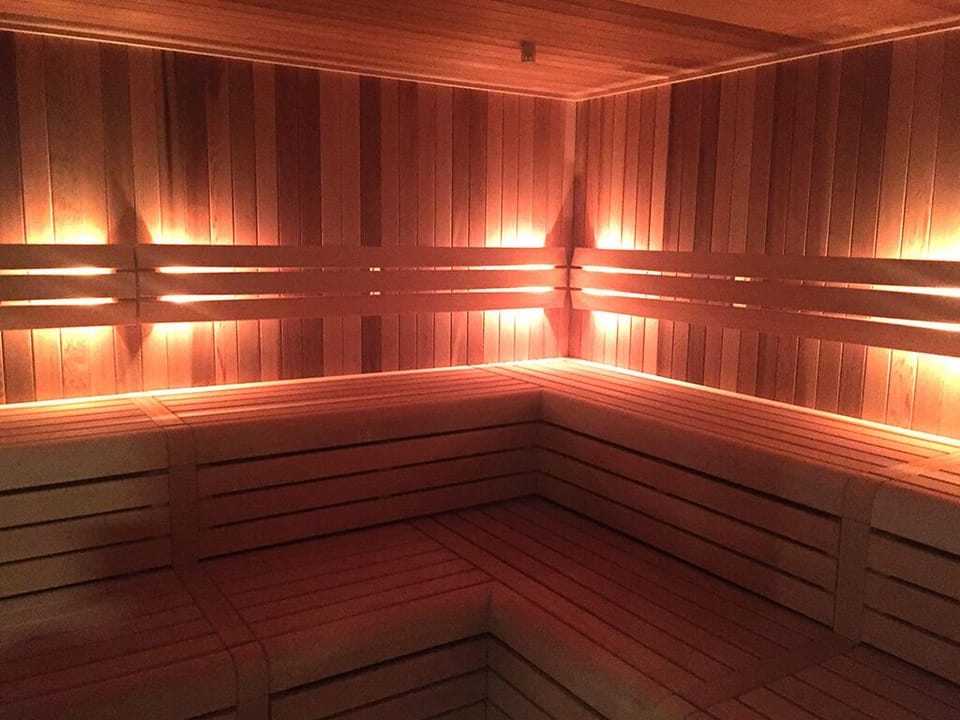 Melt into soothing heat in the softly glowing sauna.