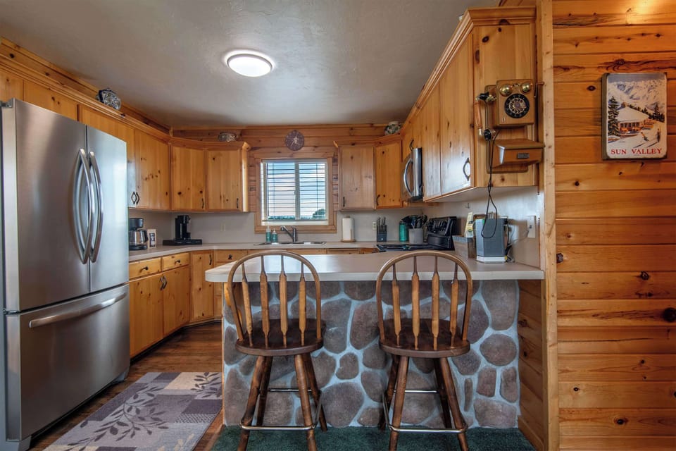 A fully stocked kitchen with stainless appliances means home-cooked meals are easy.