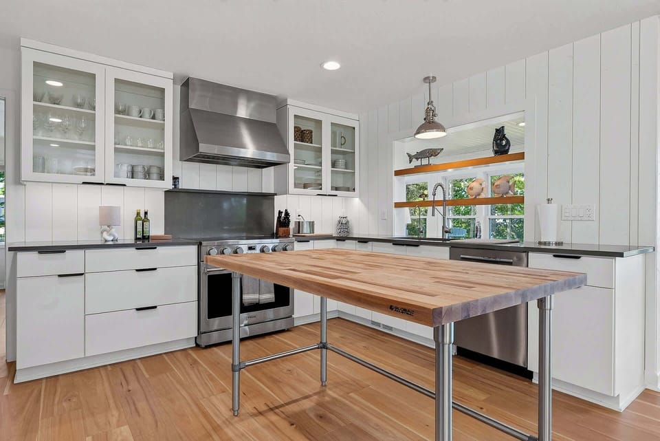Large open kitchen with butcher block island