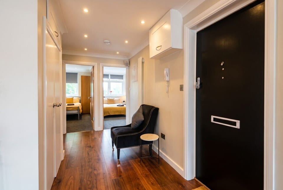 Smart entrance hall opening onto calm and inviting bedroom spaces