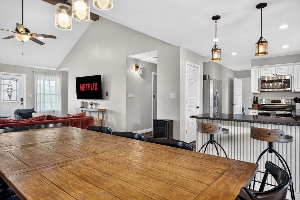 Dining Area: A warm and inviting dining area provides the perfect spot to sit down, share a meal, and spend quality time together throughout your stay.