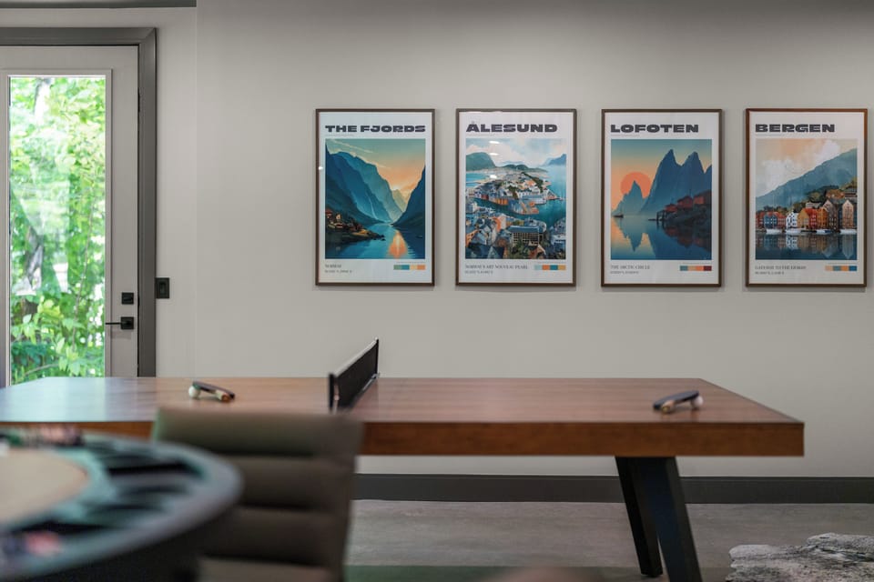 Modern game room with Nordic art and bright garden-view natural light