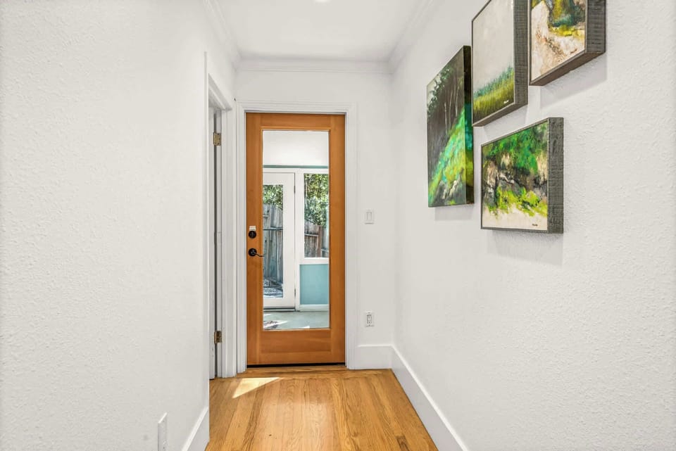 Hallway leading to the bedrooms and living spaces.